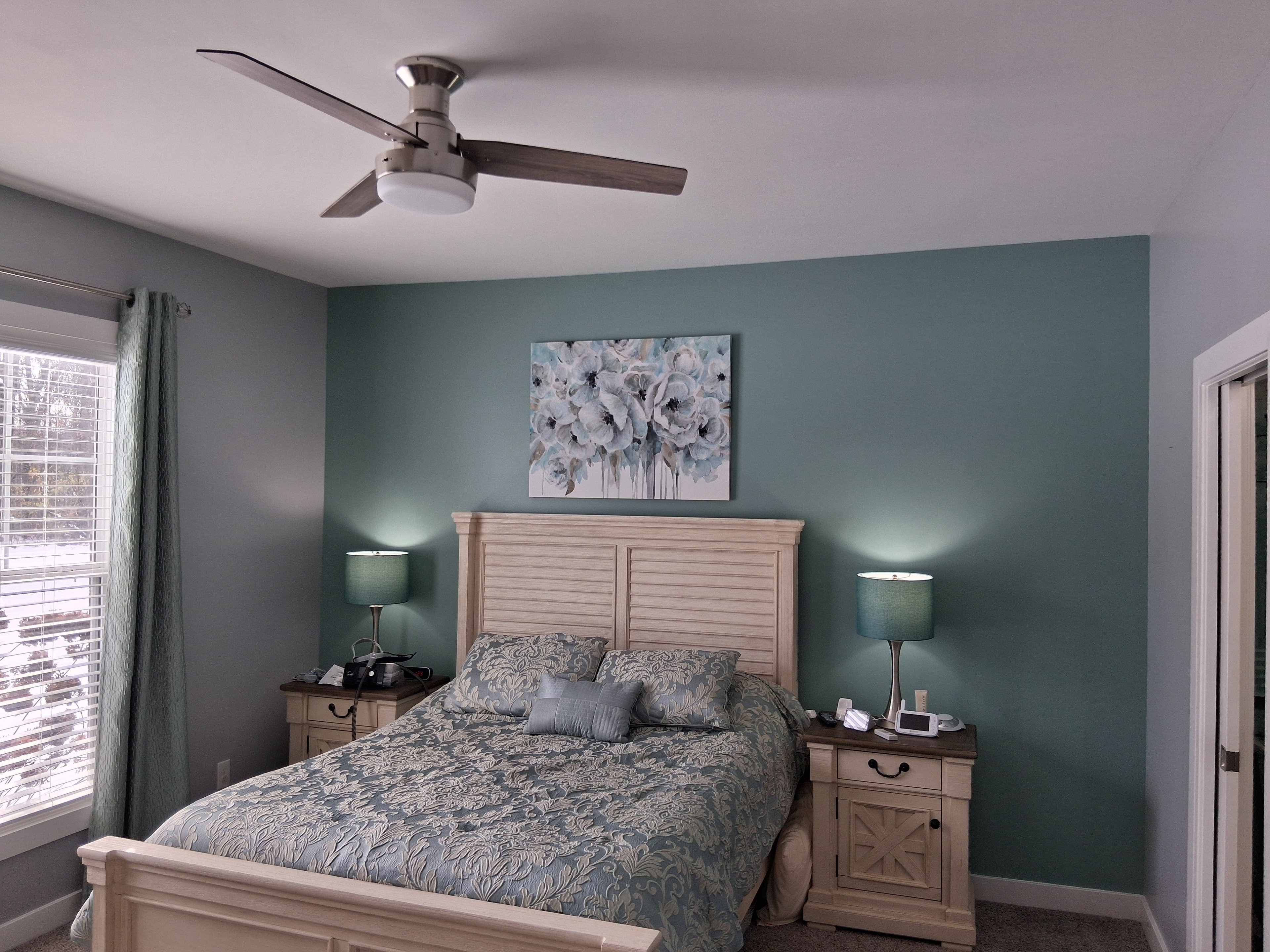 Bedroom with teal painted walls