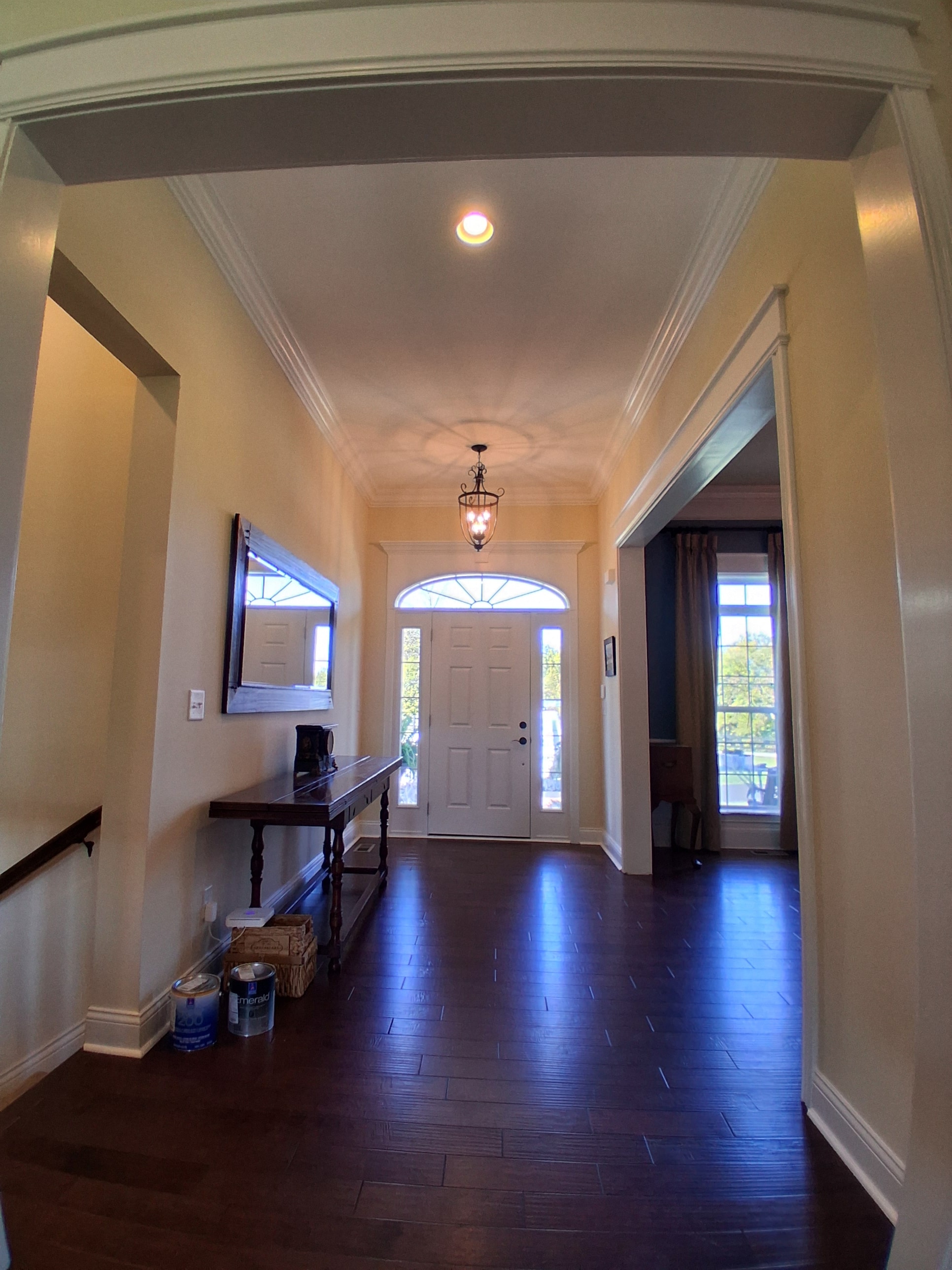 Foyer and entryway with painted walls