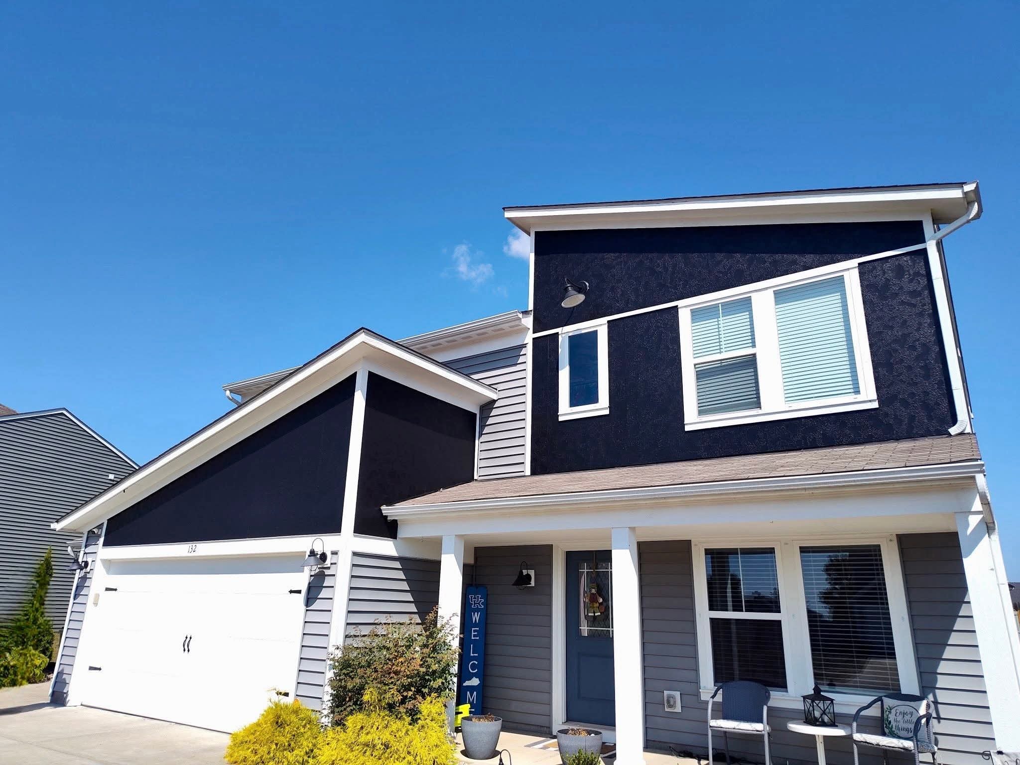 House with dark upper exterior