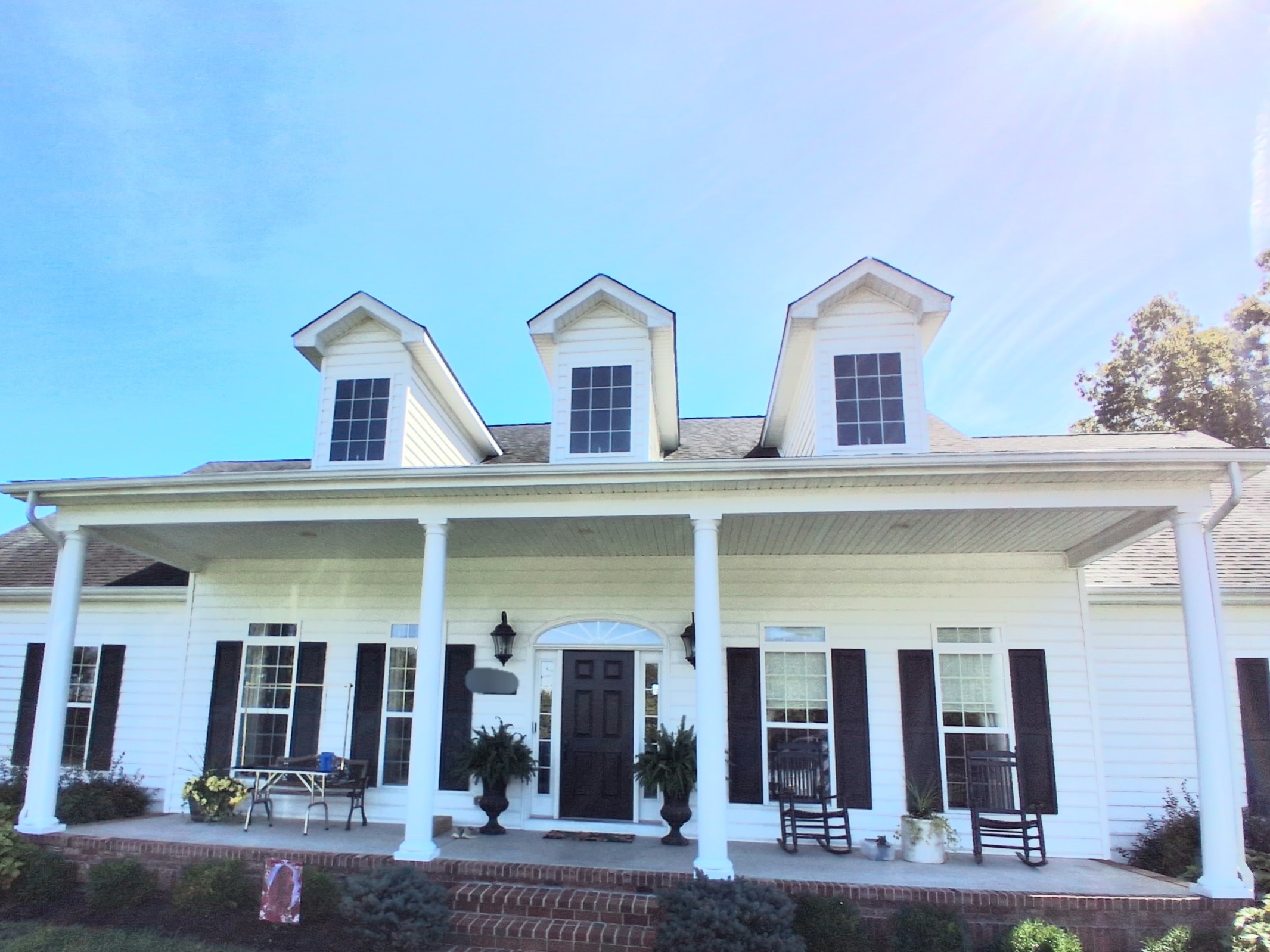 White farmhouse exterior