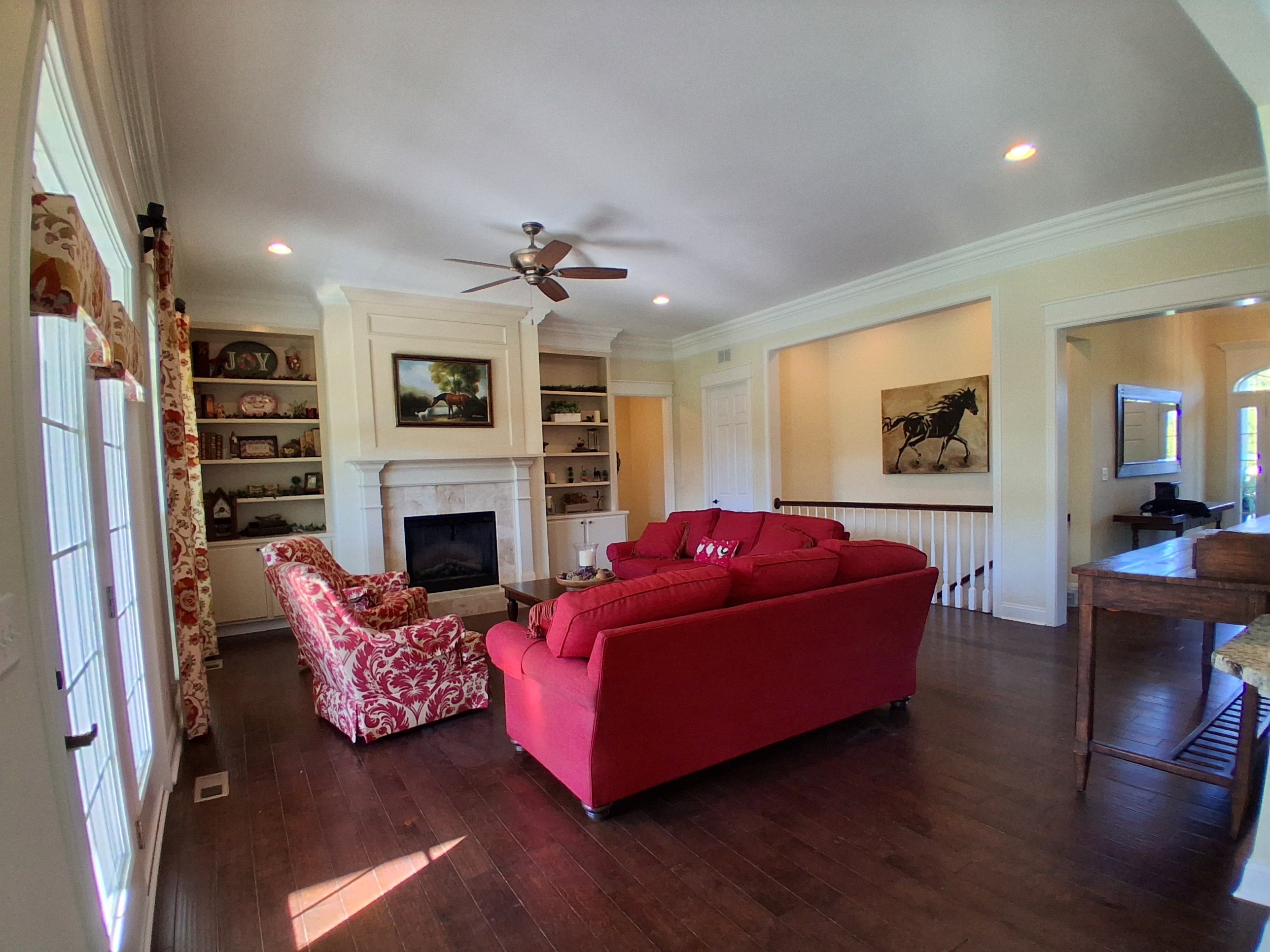 Living room with red sofa